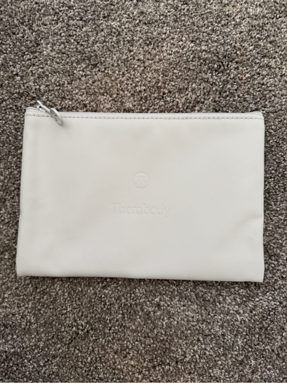 Therabody Cream Zip Pouch with Embossed Logo